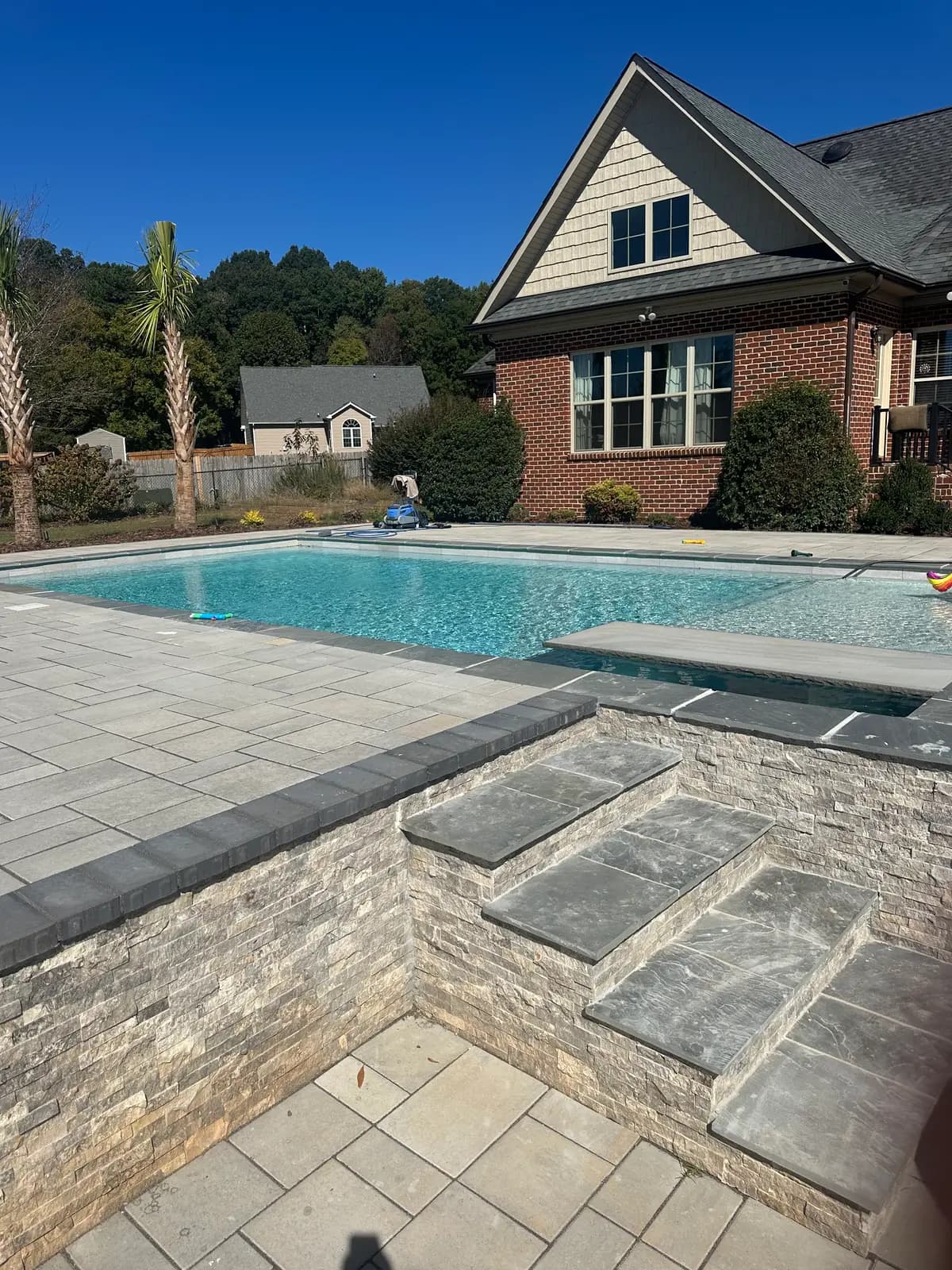 Custom gunite pool with outdoor lighting in Monroe, NC, view 8