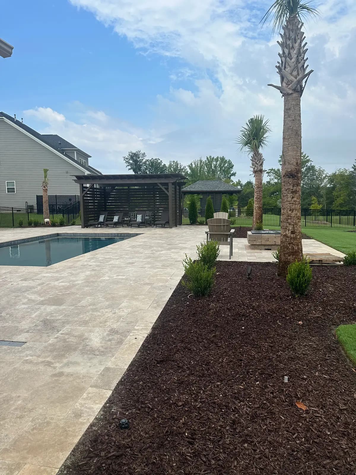 Custom gunite pool with an outdoor kitchen in Huntersville, NC, view 5