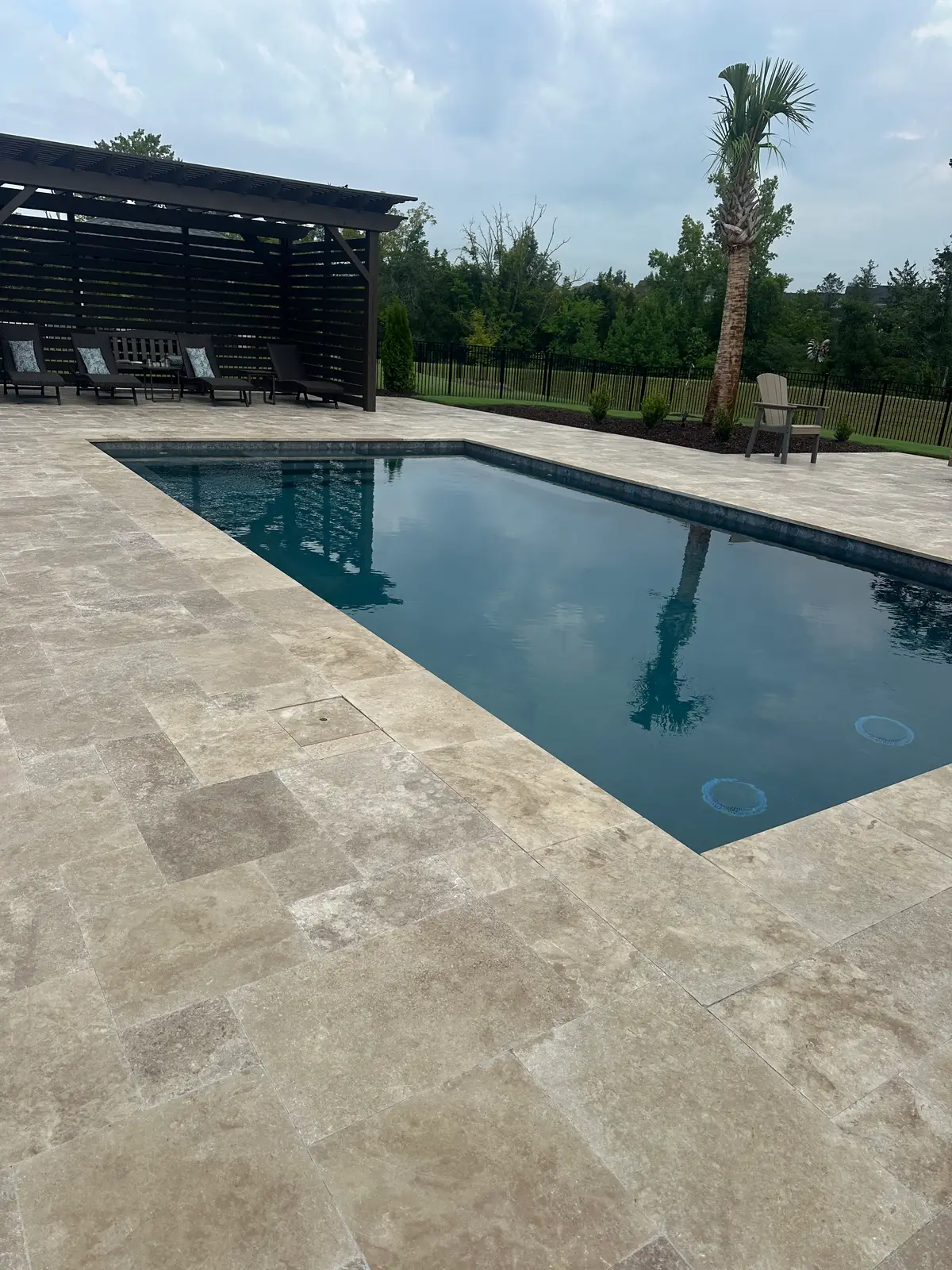 Custom gunite pool with an outdoor kitchen in Huntersville, NC, view 14