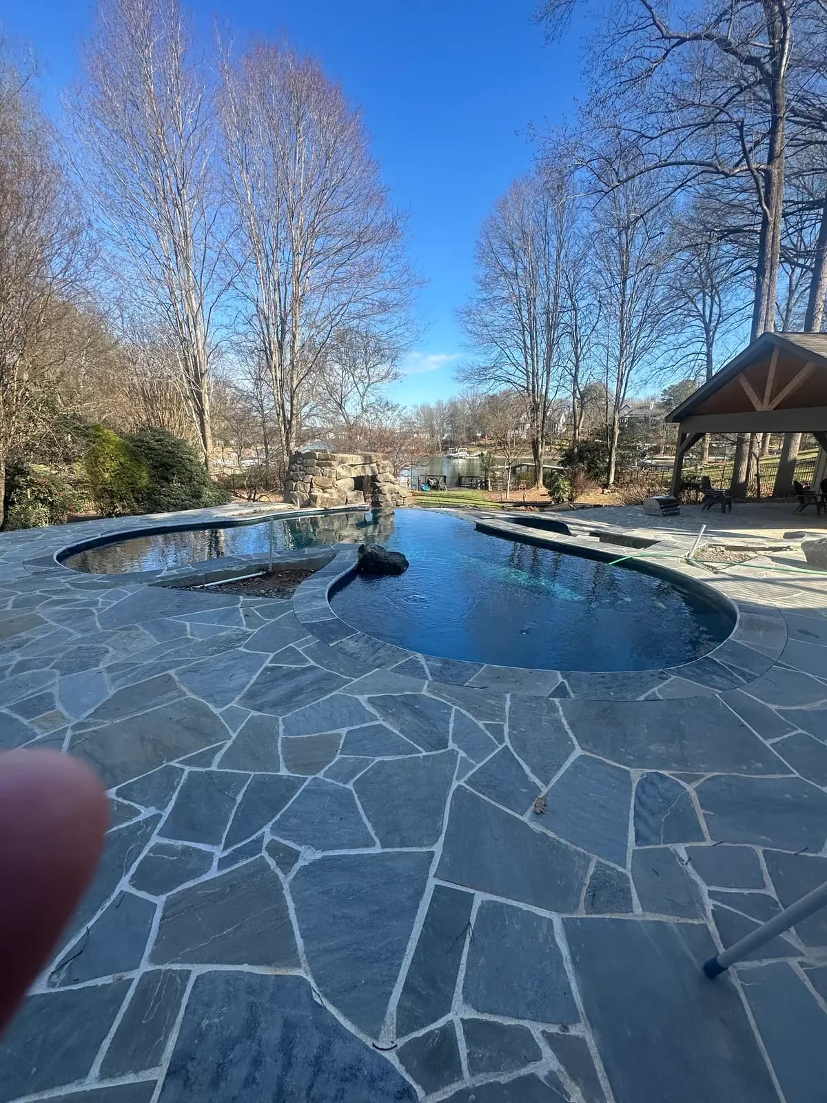 Lagoon-style pool in Cornelius, NC built by Aqua Pools & Outdoor Living