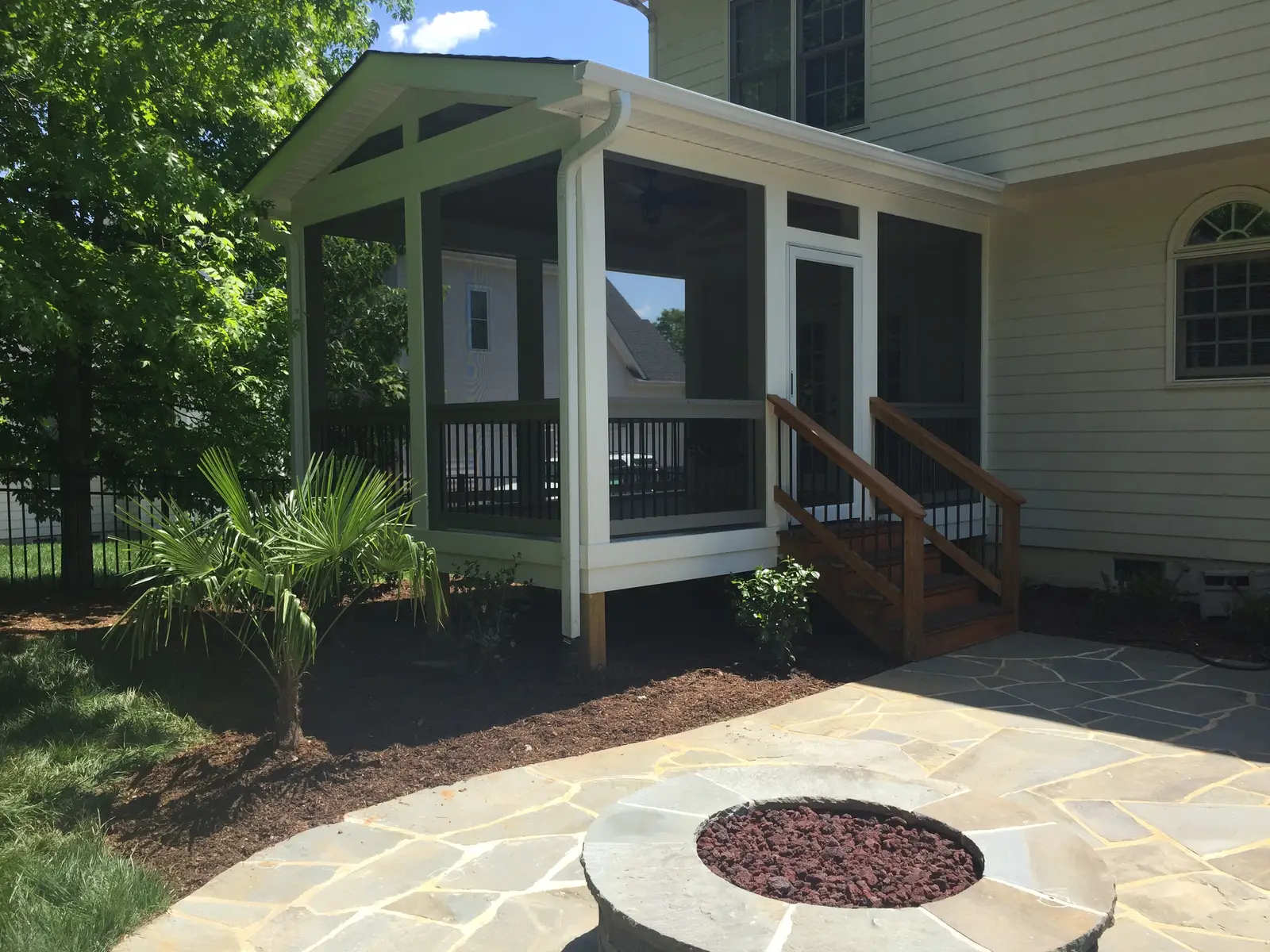 Outdoor kitchen with a covered structure in Charlotte, NC built by Aqua Pools & Outdoor Living