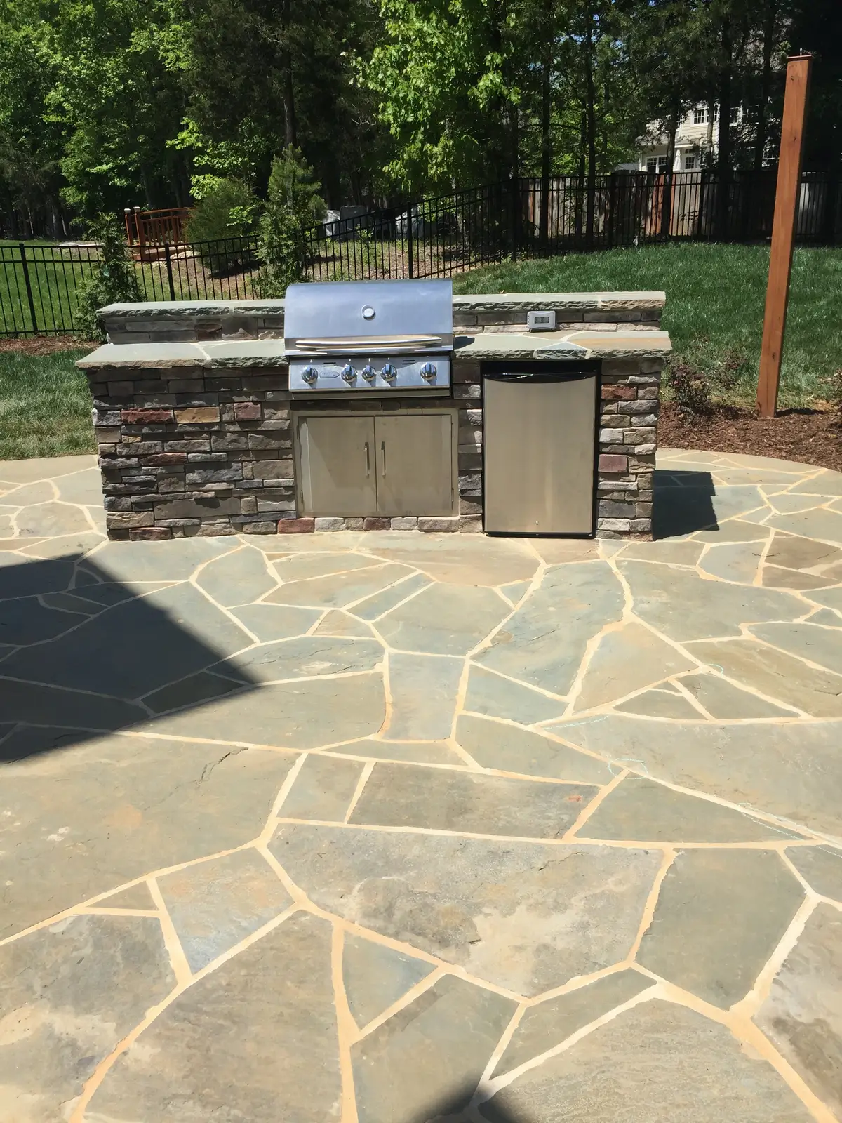 Outdoor kitchen with a covered structure in Charlotte, NC, view 2