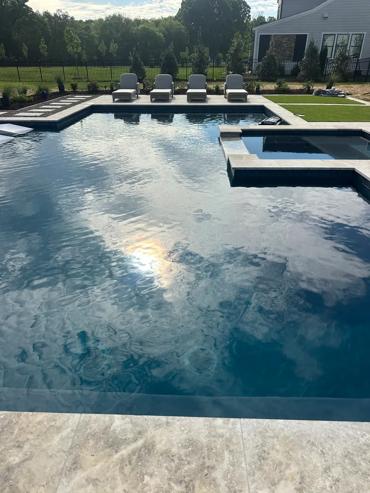 Gunite pool and spa with an outdoor kitchen in Huntersville, NC, view 13