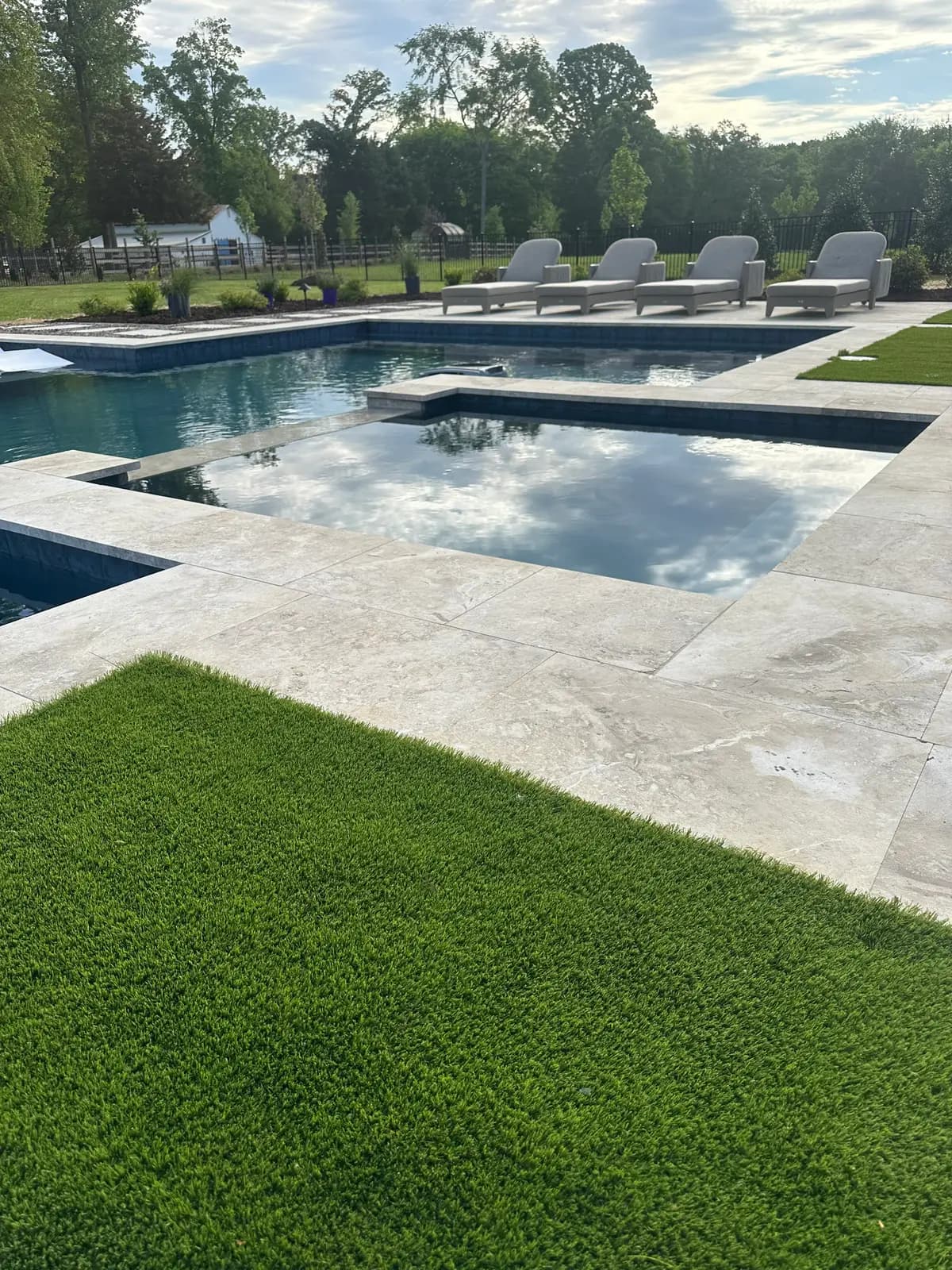 Gunite pool and spa with an outdoor kitchen in Huntersville, NC, view 14