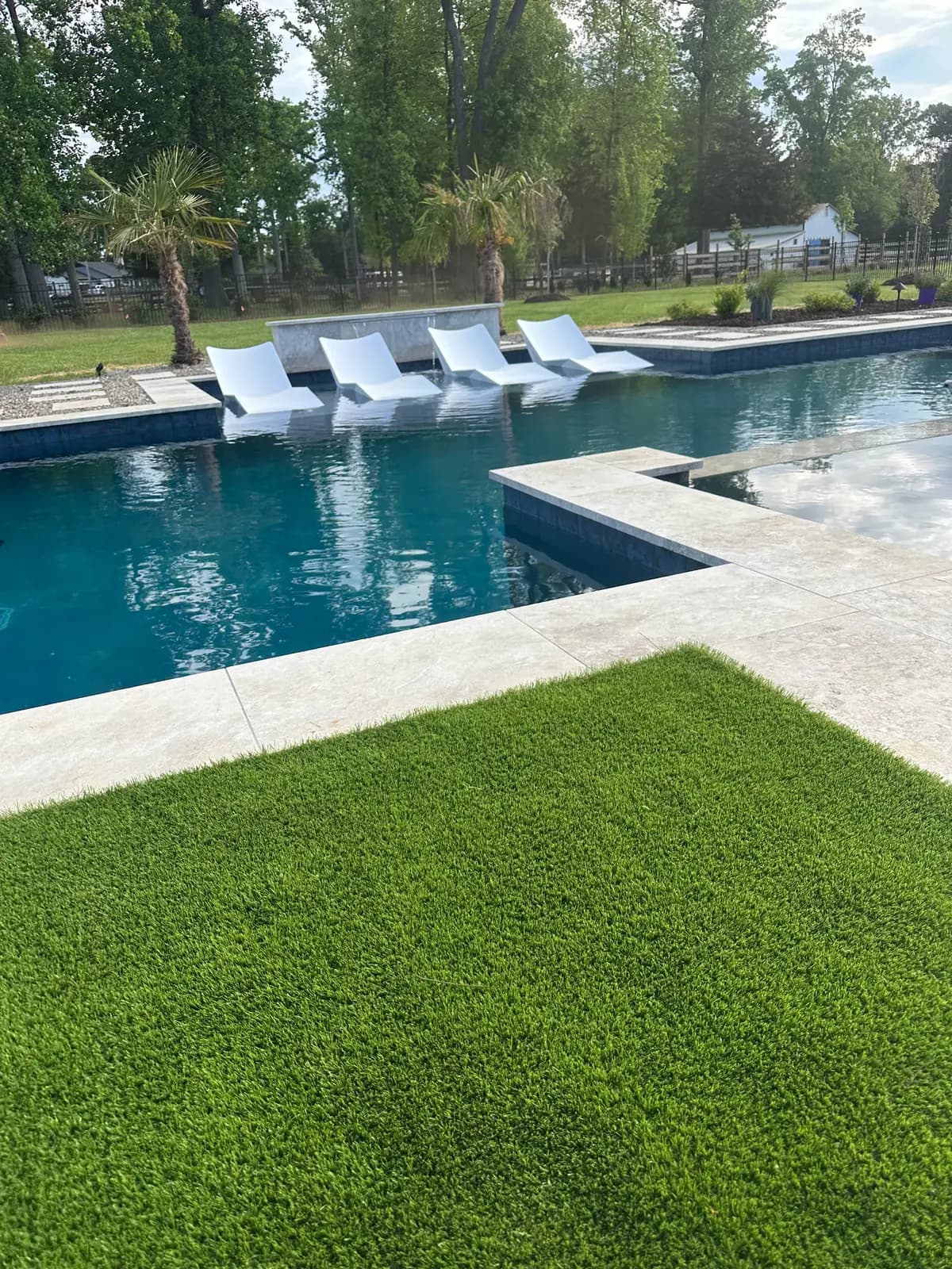 Gunite pool and spa with an outdoor kitchen in Huntersville, NC, view 15