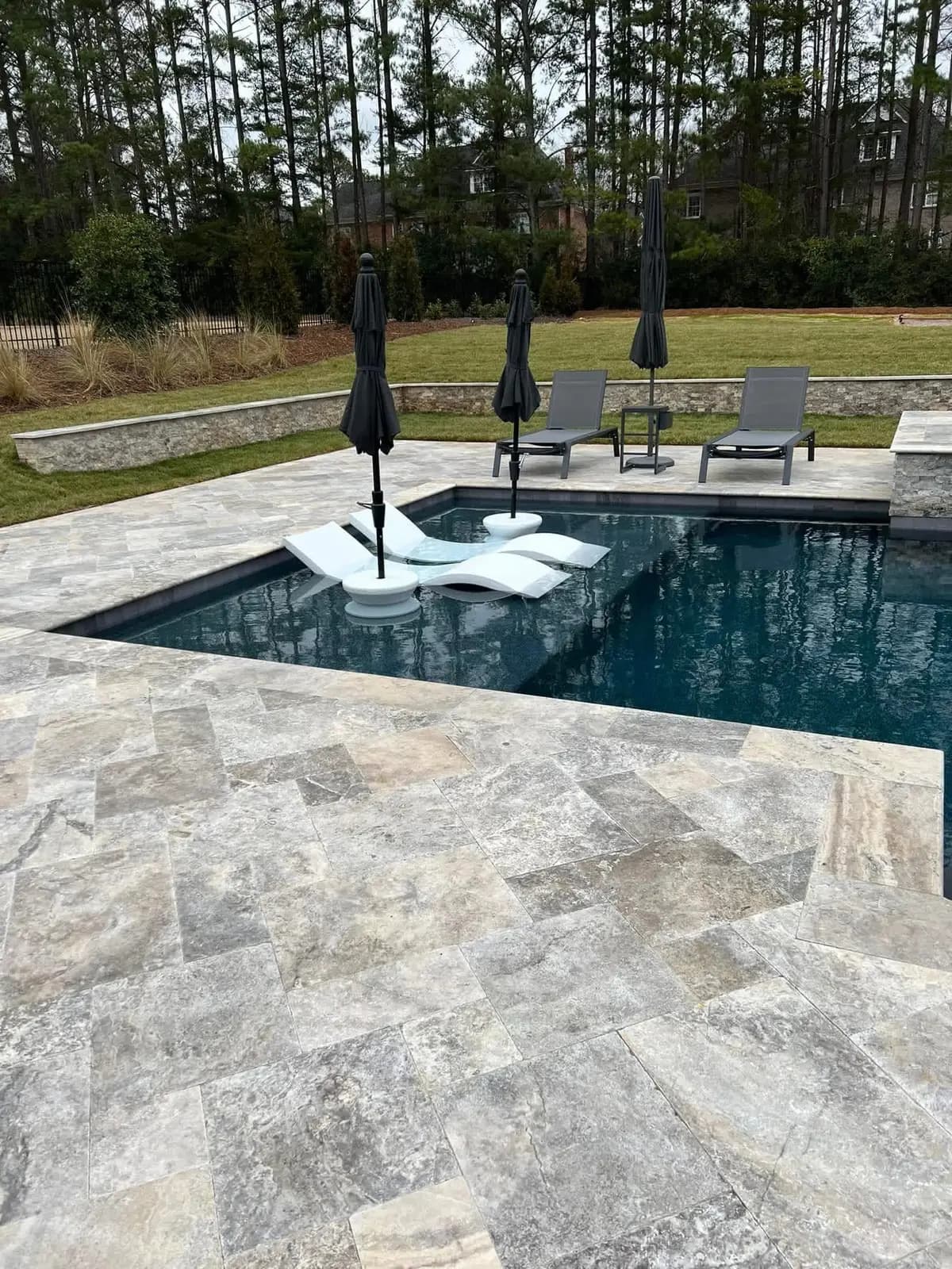 Gunite pool and spa with fencing in Weddington, NC built by Aqua Pools & Outdoor Living