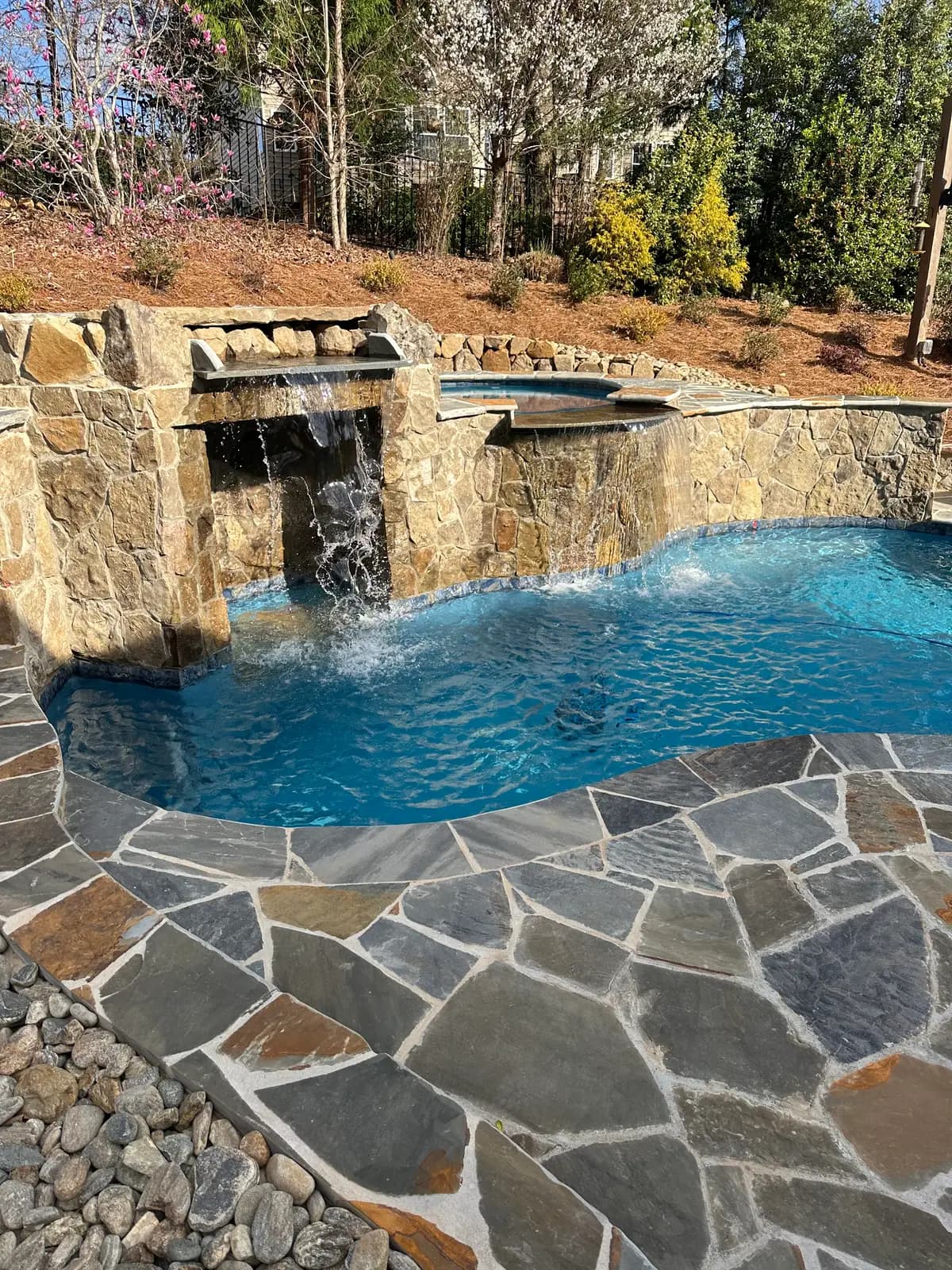Gunite pool and spa with outdoor lighting in Harrisburg, NC, view 3