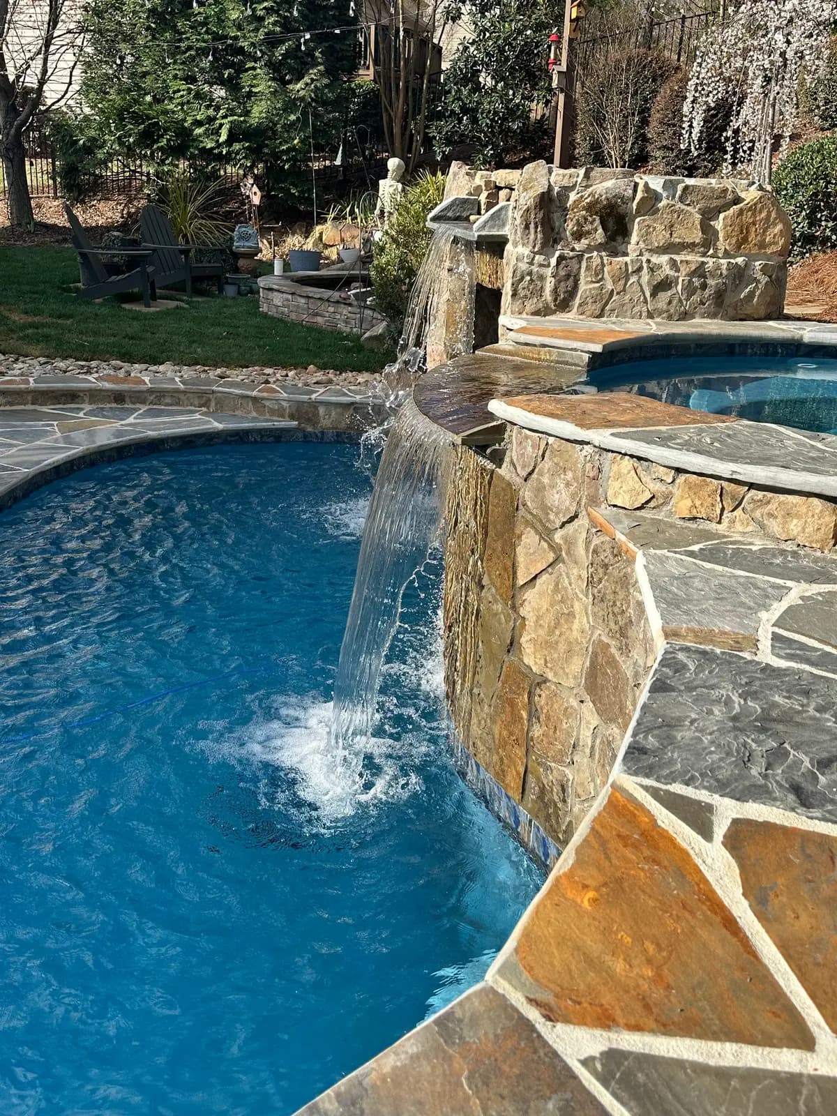 Gunite pool and spa with outdoor lighting in Harrisburg, NC, view 5