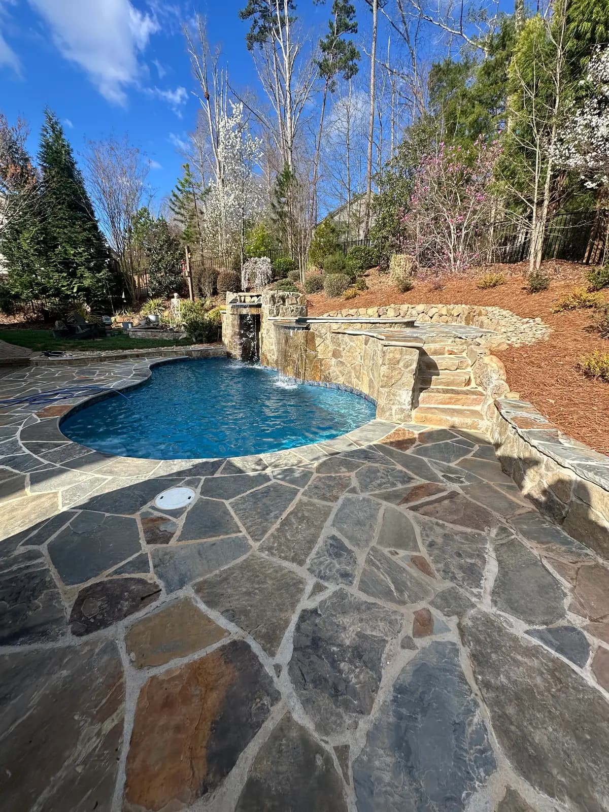 Gunite pool and spa with outdoor lighting in Harrisburg, NC, view 6