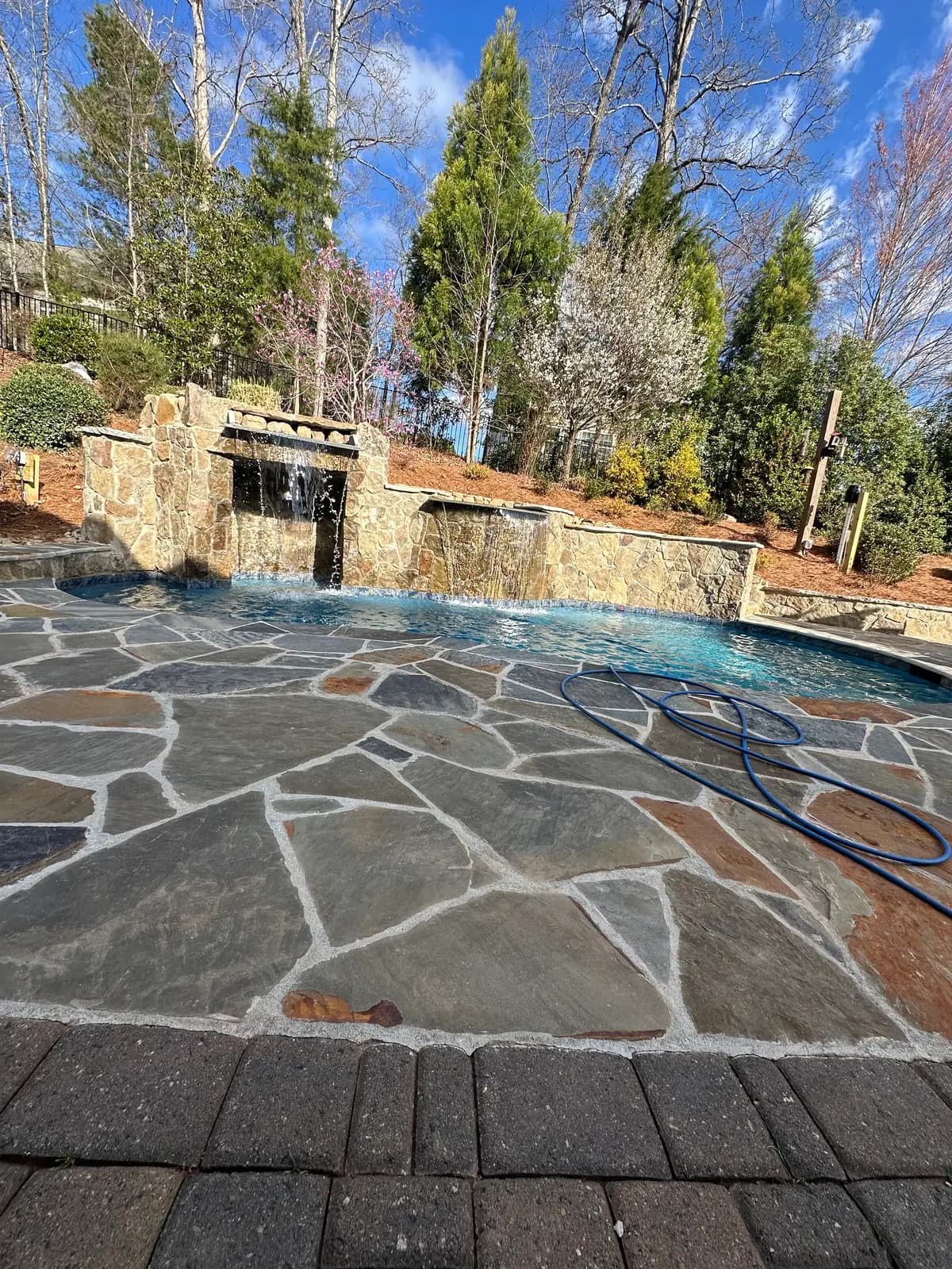 Gunite pool and spa with outdoor lighting in Harrisburg, NC, view 8