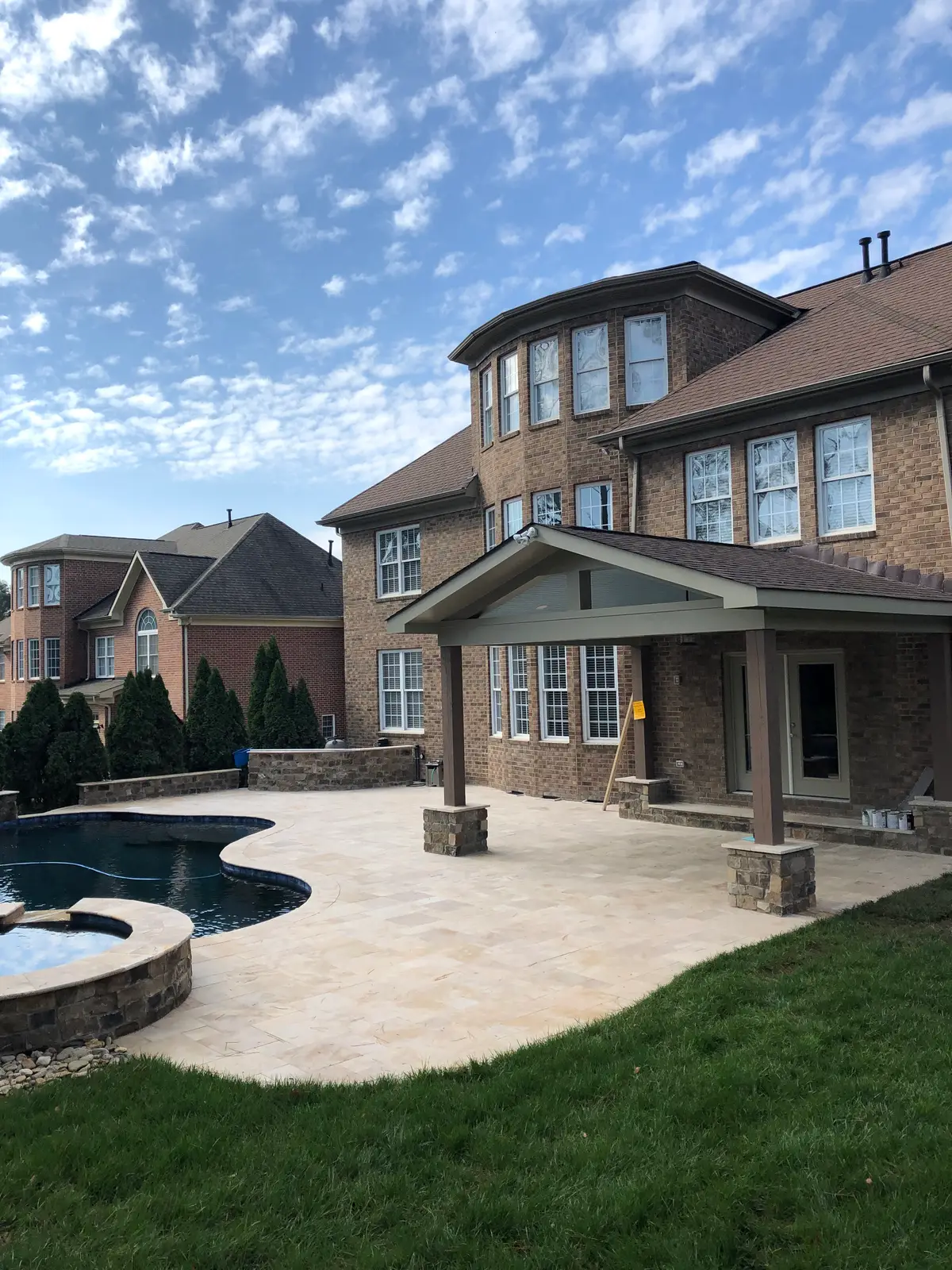 Gunite pool and spa with a covered structure in Huntersville, NC, view 2