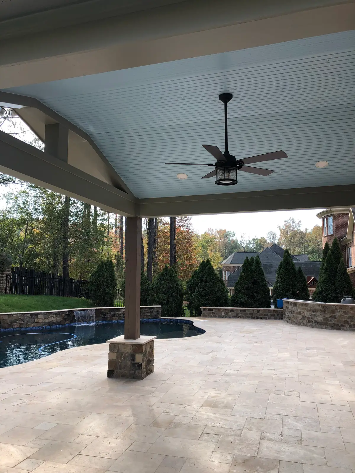 Gunite pool and spa with a covered structure in Huntersville, NC, view 3