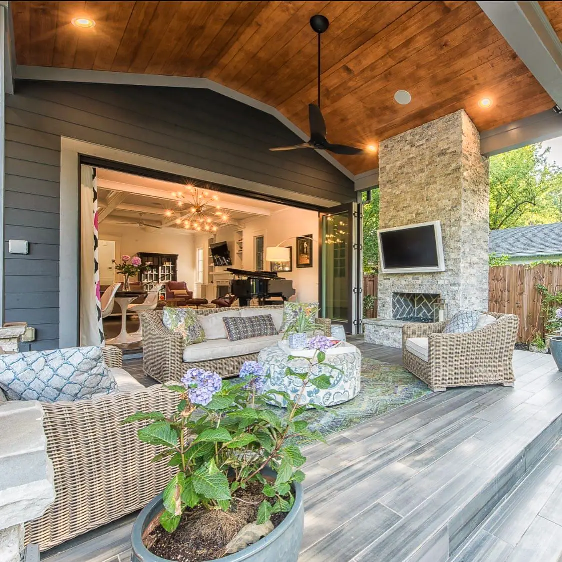 Covered outdoor room with outdoor lighting in Charlotte, NC built by Aqua Pools & Outdoor Living