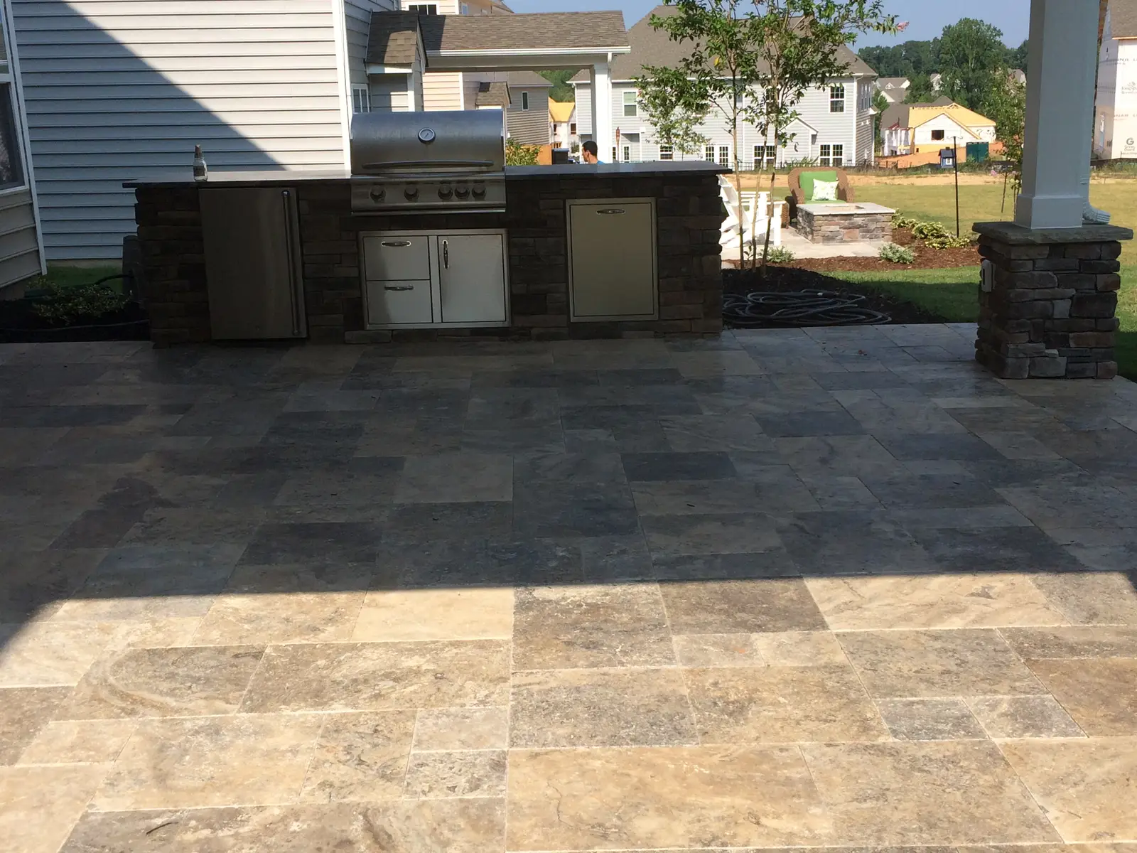 Covered outdoor room with an outdoor kitchen in Waxhaw, NC, view 5