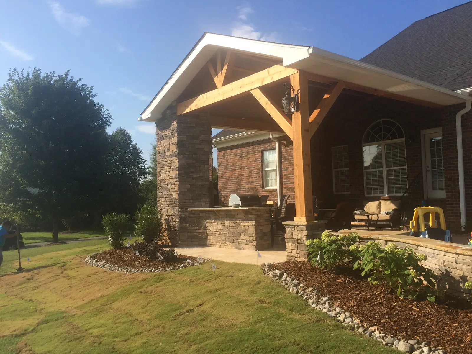 Covered outdoor room with an outdoor kitchen in Weddington, NC, view 3