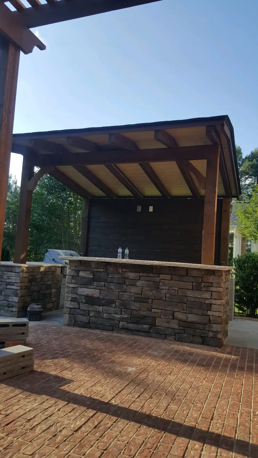 Covered outdoor room with an outdoor kitchen in Charlotte, NC, view 6