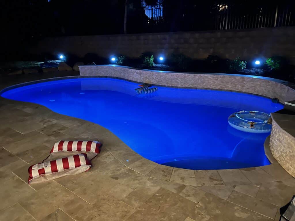 Custom inground pools by Aqua Pools & Outdoor Living showcasing luxurious designs for Texas backyards.
